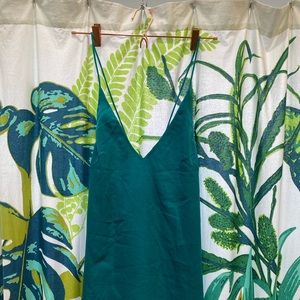 Blue satin dress with tie-back string.